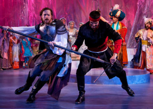 In the colorful kingdom of Pentapolis, Pericles (Jon Barker) battles a knight (Jordan Laroya) during Princess Thaisa’s birthday tournament. Photo: ©Jerry Dalia