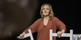Orlagh Cassidy holds onto the chairs in her set