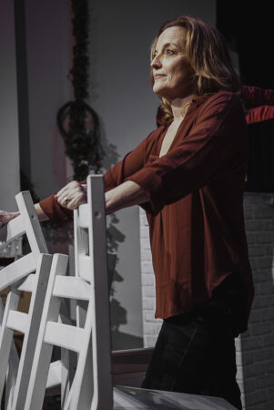 Orlagh Cassidy holds onto the chairs in her set. 